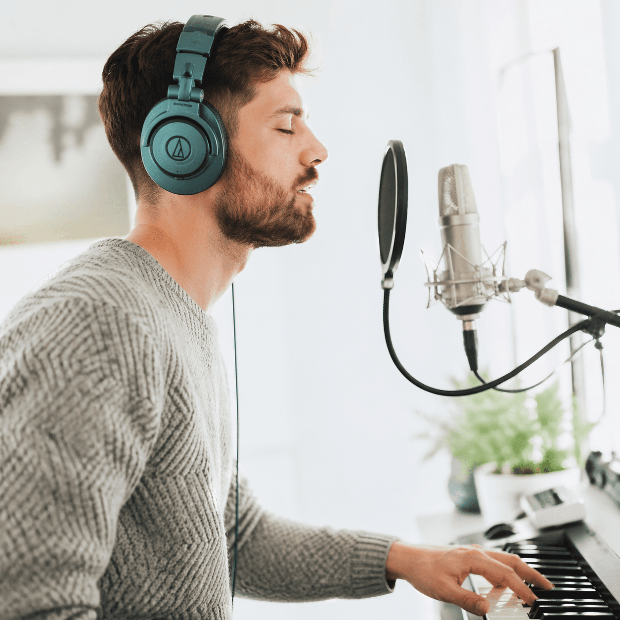 Professional recording microphone in modern music studio setup
